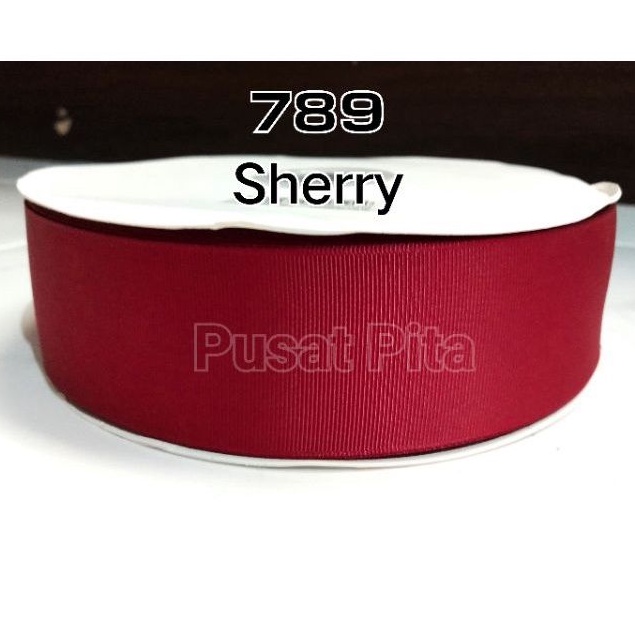 

pita grosgrain 5cm Rp 6.000/meter warna maroon sherry.