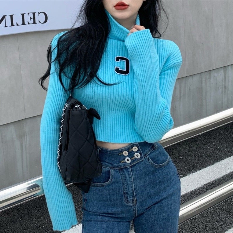 Sweater turtleneck pendek wanita 2021 musim dingin desain baru pakaian rajut niche gaya Barat kemeja