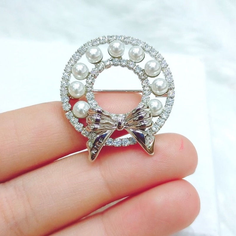 zircon brooch