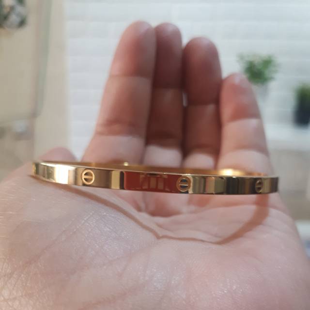 Gelang titanium cartier polos wrn gold