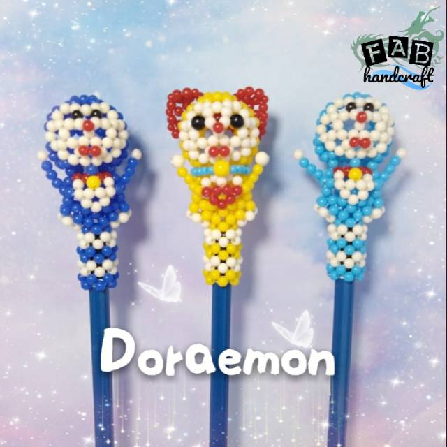 

Ganci & Tutup Pensil Doraemon - manik monte / Souvenir