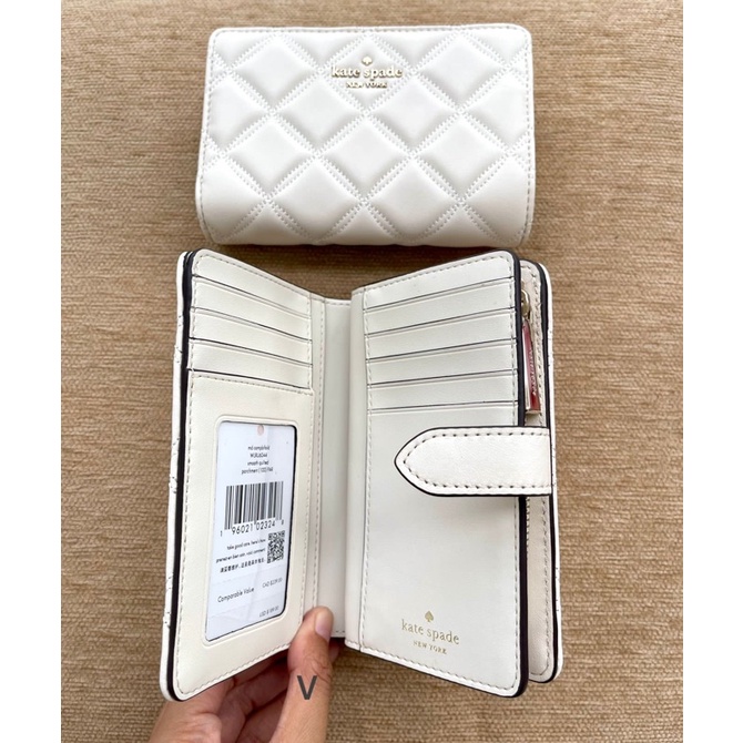 Kate Spade Natalia medium bifold zip parchment
