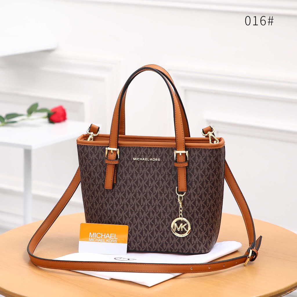 MK Carryall Jet Set Travel Medium Bag  016 RR55 TAS SELEMPANG WANITA TERMURAH IMPORT