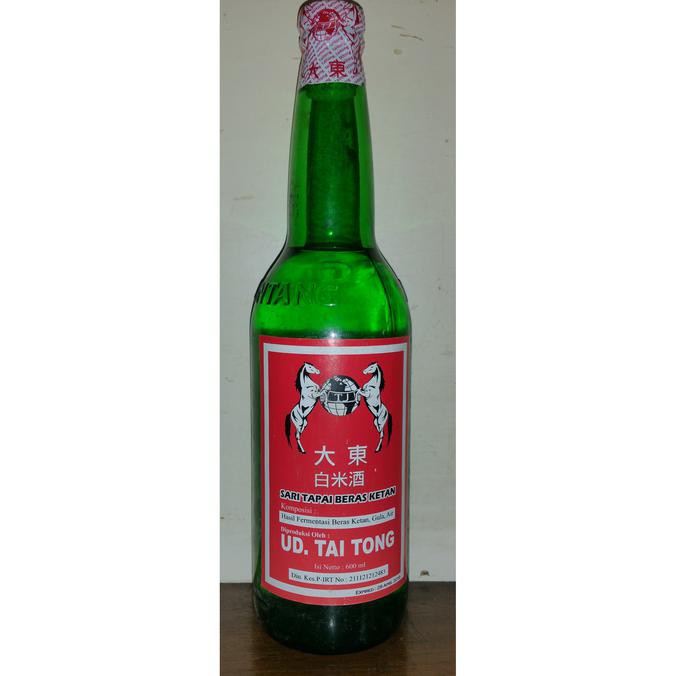 

Arak Putih Sari Tapai Beras Ketan UD. Tai Tong Cap Kuda Merah 600ml