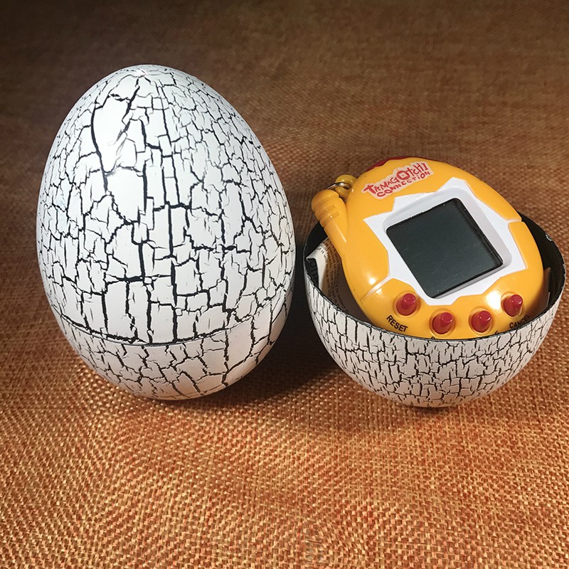 Set Mainan Tamagochi dengan Tempat Bentuk Telur Dinosaurus Model Retro untuk Anak-anak