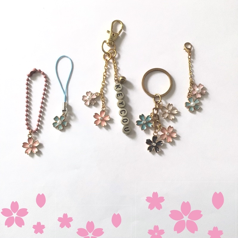 

Gantungan pensil/HP enamel bunga sakura