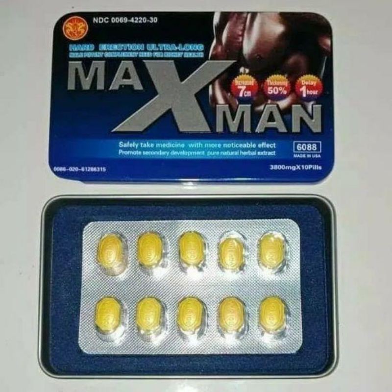 Maxman original obat tablet pria dewasa di atas ranjang