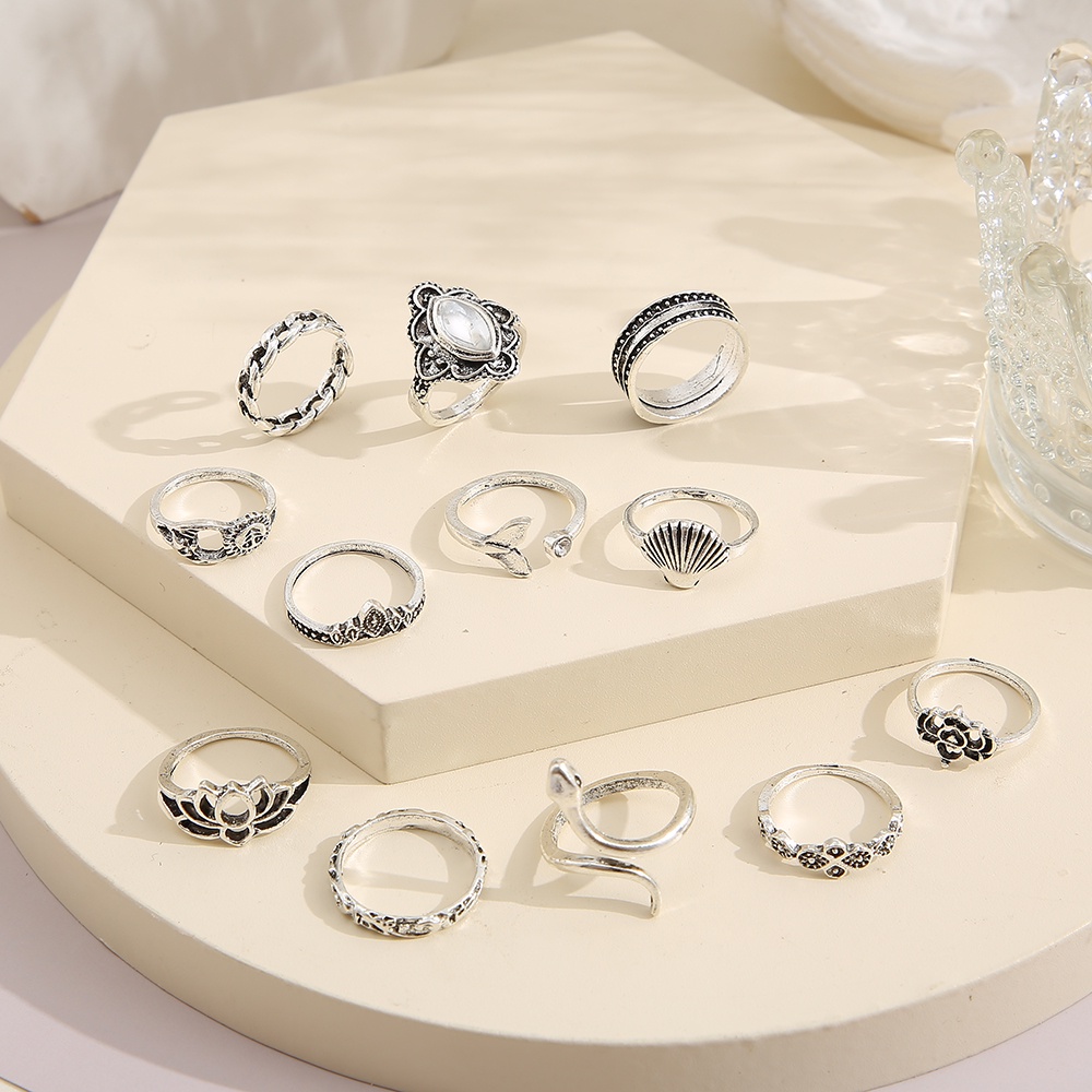 Set Cincin Model Terbuka Desain Bintang Kupu-Kupu Hollow Bahan Metal Warna Silver Gaya Korea Untuk Wanita