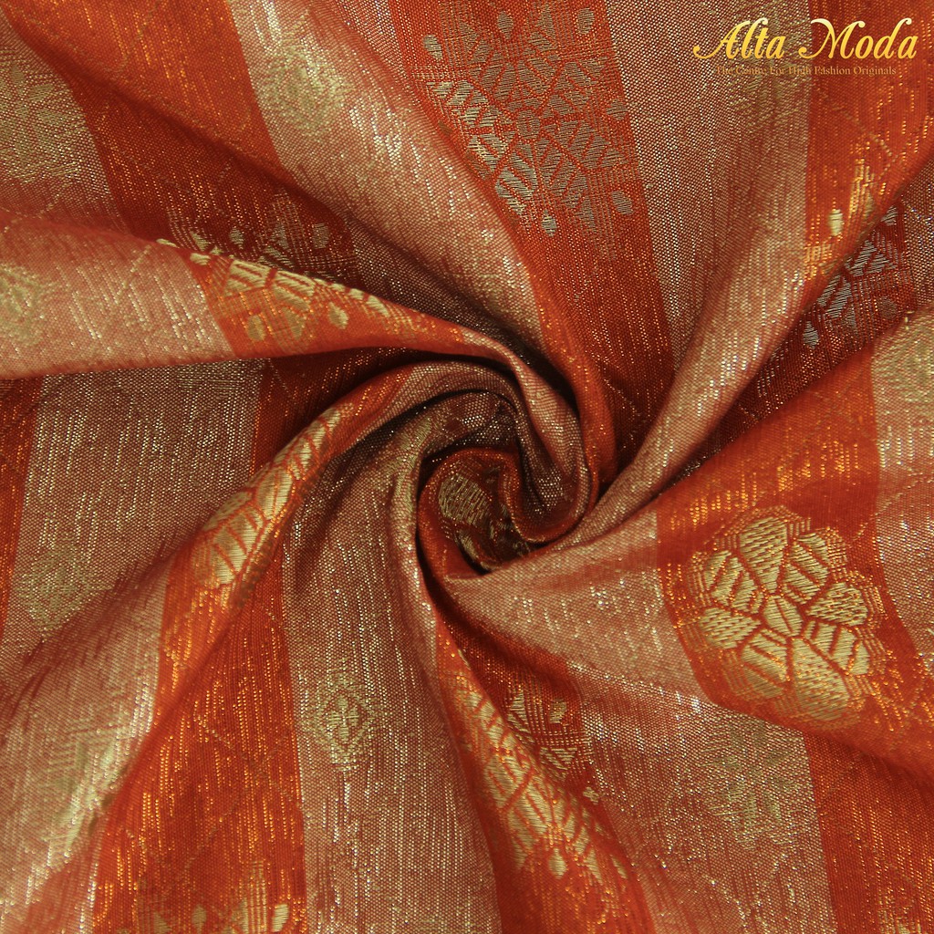 

Alta Moda Songket Motif Palembang Orens Mix Benang Gold (1M)