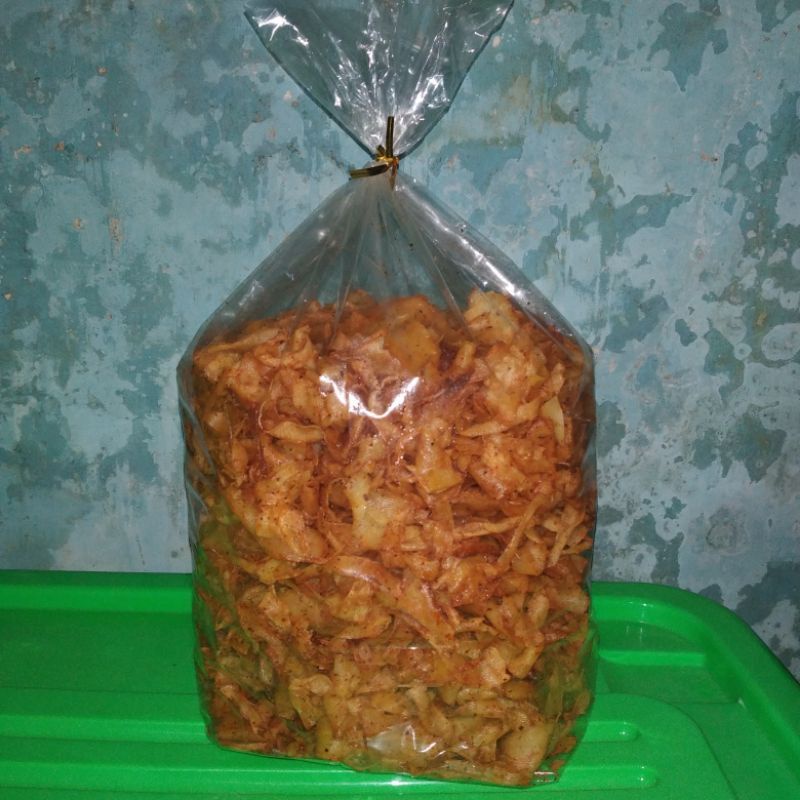 

1 KG - Kripik Singkong Serut/Kripik Brekele/Rasa Pedas Aroma Daun Jeruk