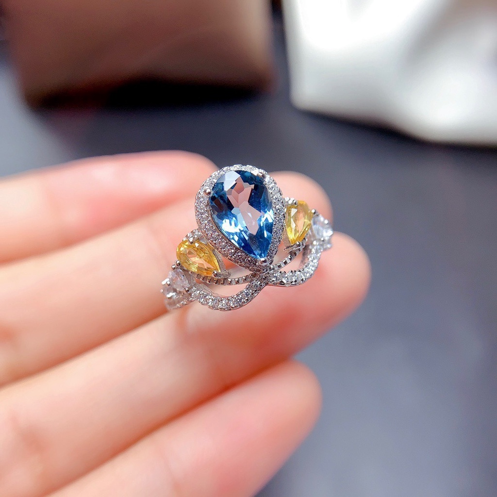 Cincin Model Terbuka Desain Mahkota Hias Topaz Biru Gaya Simple Untuk Wanita