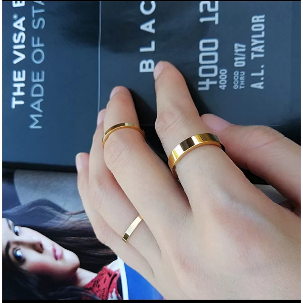 Cincin Unisex Model Polos Flet dan Sederhana Tersedia Warna Gold dan Silver