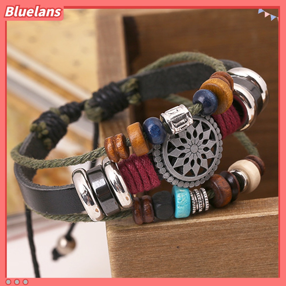 Gelang Tali Kulit Sapi Multilayer Adjustable Aksen Manik-Manik Kayu Alloy Gaya Retro Punk Untuk Unisex