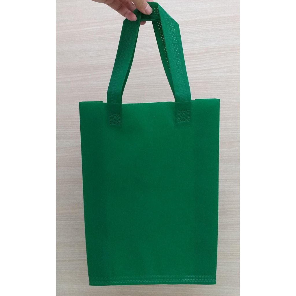 

GOODIE BAG SPUNBOND HANDLE 25x35 / Tas Belanja Murah / Kantong Belanja/ Souvenir (Hijau Tua)