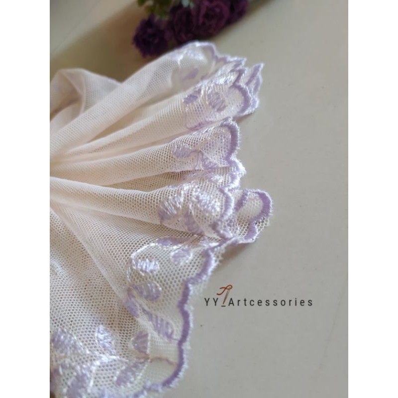 Renda Tile bordir ungu