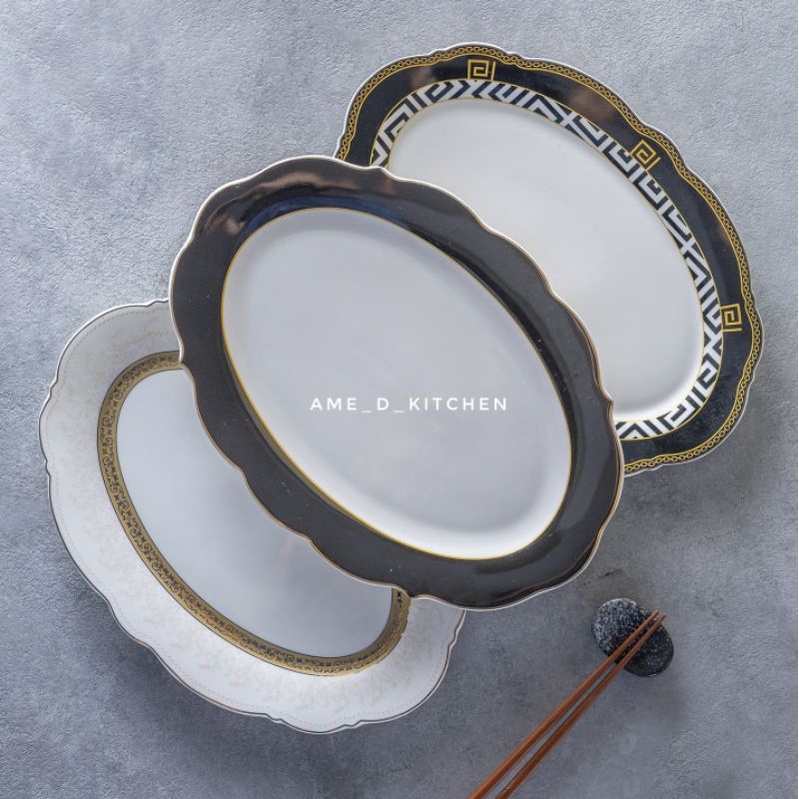 Piring bijian oval keramik 12" gelombang motif hitam gold