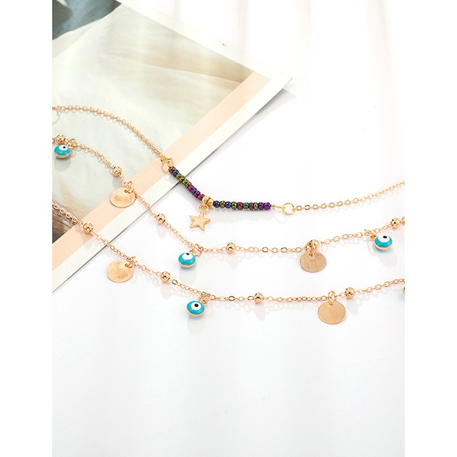 LRC Gelang Kaki Fashion Gold Mizhu Alloy Disc Eyes Hollow Star Multi-layer Anklet F78064