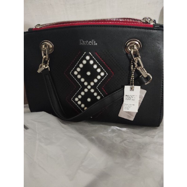 tas rotelli hitam