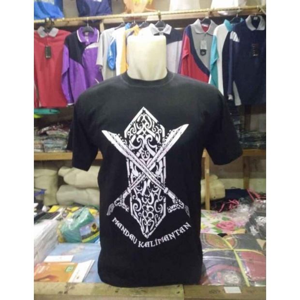 Baju Kaos Cowo/Cewe. Baju Kos Etnik Dayak Kalimantan. Motif Mandau Senjata Dayak Kalimantan