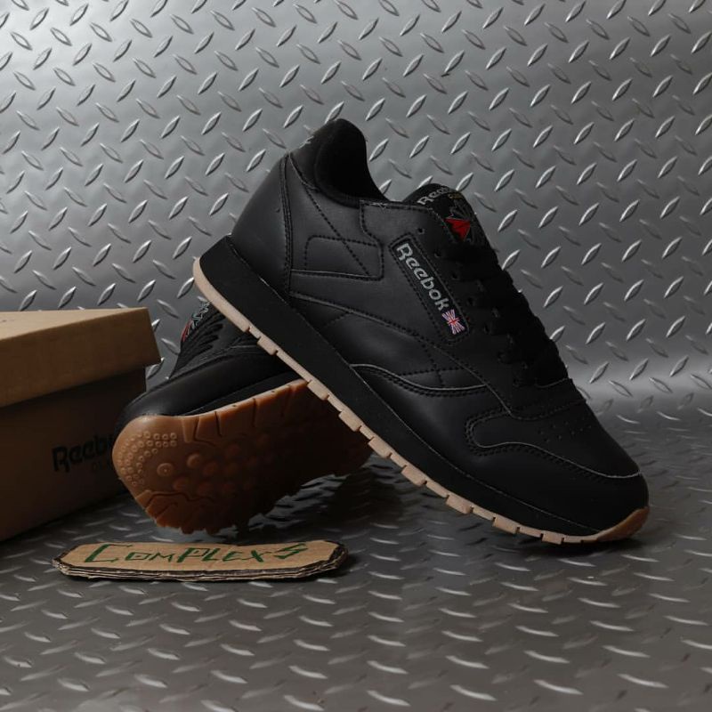 black reebok leather