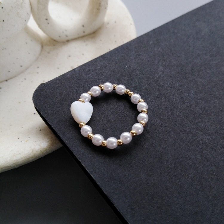 Korean version of pearl fashion elastic rope simple love peach heart-shaped ring 210807