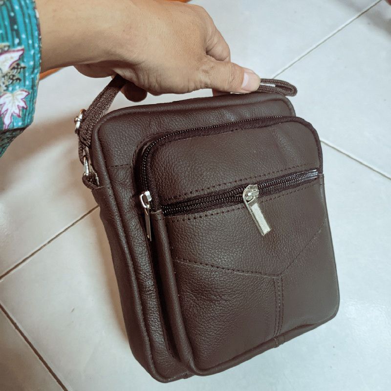 Tas kecil polos pria kulit asli mirah