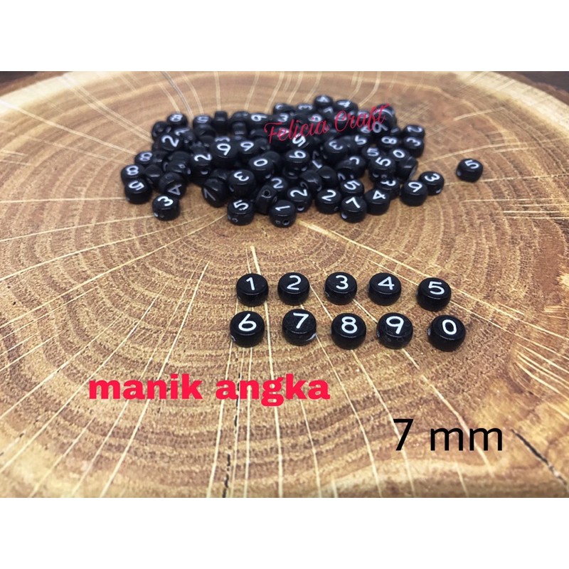 20gr [+/-160pc]. Manik mote angka hitam putih