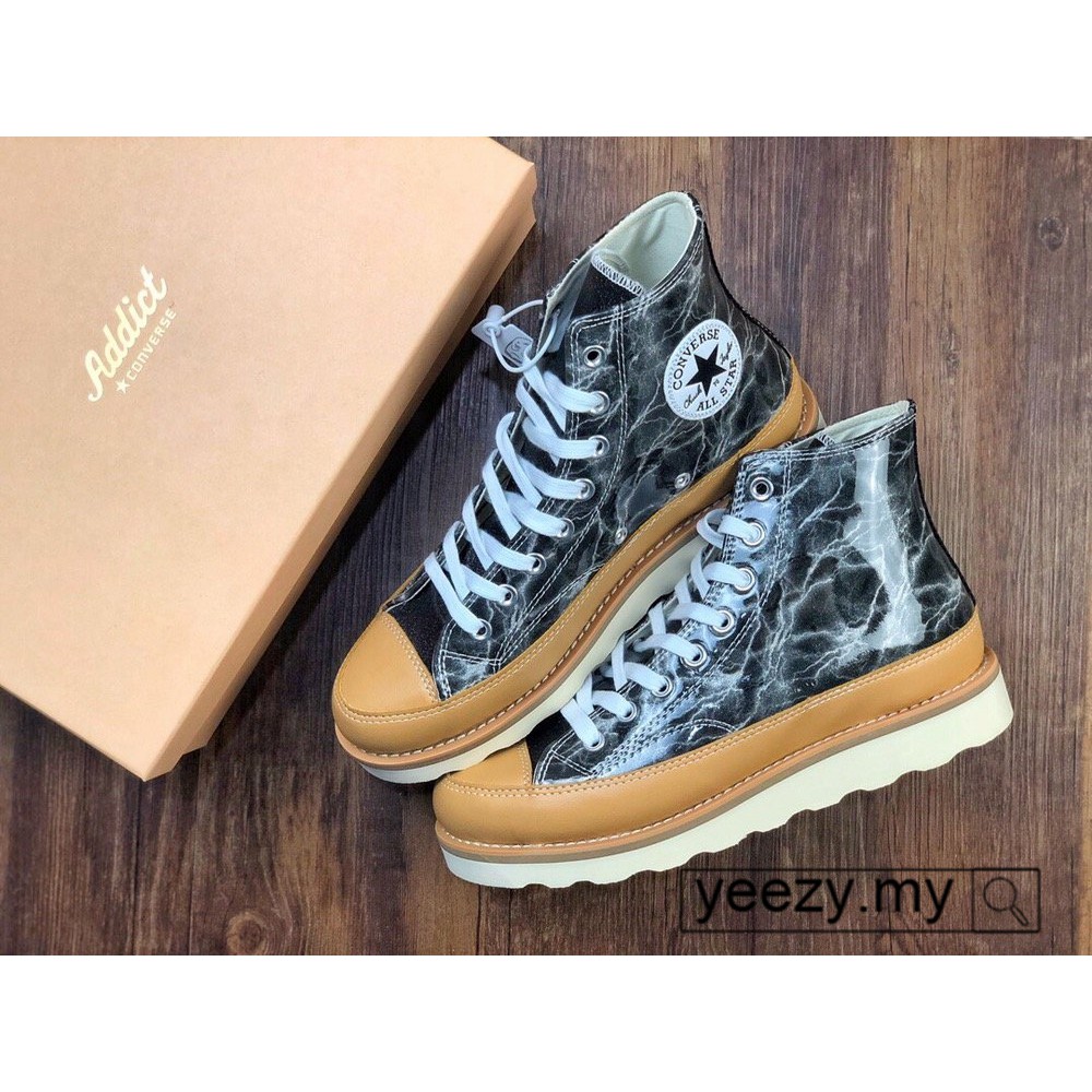 converse high sole shoes