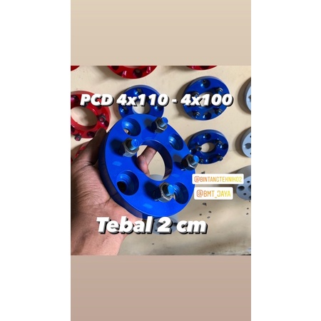 Adaptor velg mobil 4x110 - 4x100 tebal 2 cm