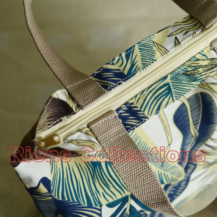 RIENS COLLECTIONS. HANDBAG BESAR BAHAN KANVAS MOTIF TROPIKAL