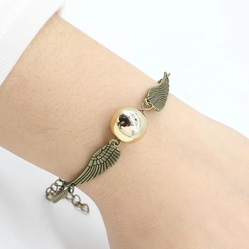 2022 Gelang Tangan Rantai Fashion Motif Sayap + Bulu + Hollow Untuk Perhiasan Wanita / Cosplay Harry Potter