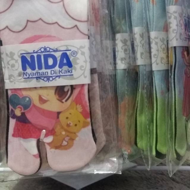 Kaos kaki anak nida printing tapak hitam..