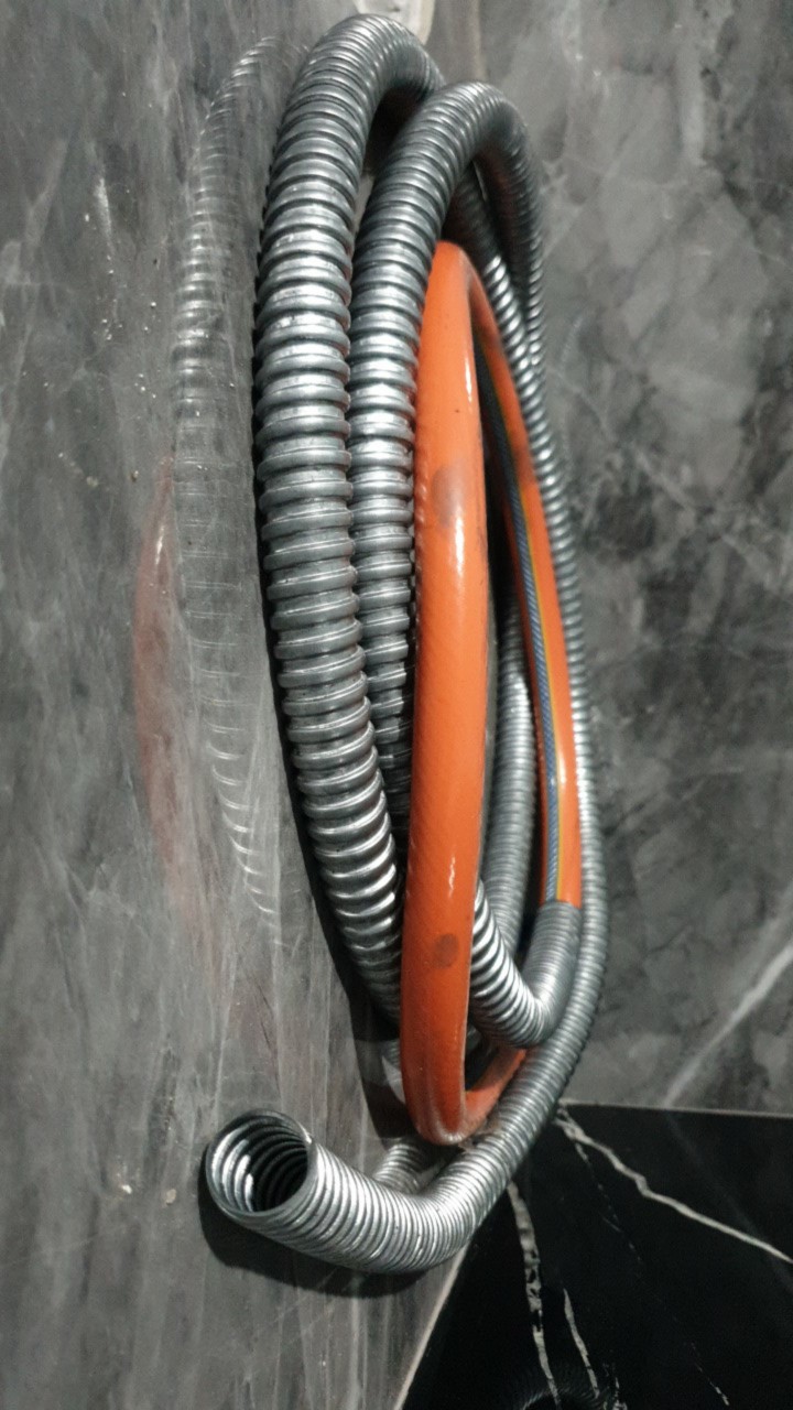 Pelindung Selang Gas Stainless Meteran Selongsong Selang