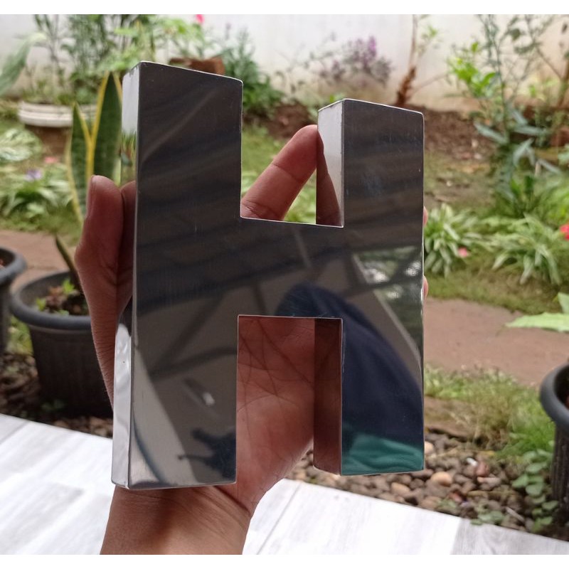 Huruf timbul stainless