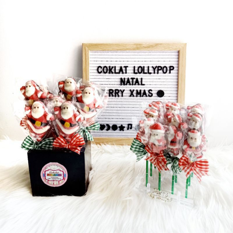 

Coklat natal mix karakter (Santa Claus, kaos kaki, pohon Cemara, boneka salju) untuk hampers godiebag souvenir sekolah Minggu