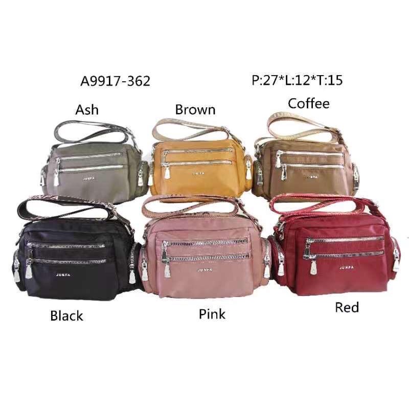 Tas selempang Junfa Bahan Parasut Terbaru. Size 27x12x15 cm. Tas Wanita Tas Selempang wanita Import Tas Junfa Import BEST SELLER TERBARU BISA BAYAR DITEMPAT.!!!!