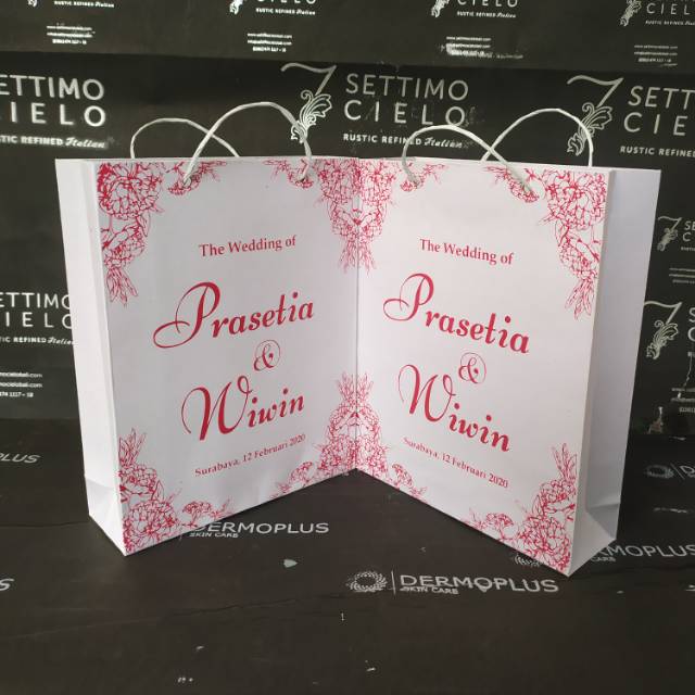 

Paperbag kraft putih 135gsm ukuran P18 x L6 x T23 free desain