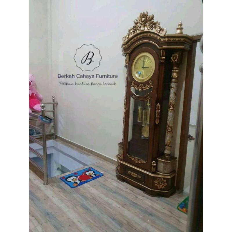 lemari jam hias jati ukir jepara