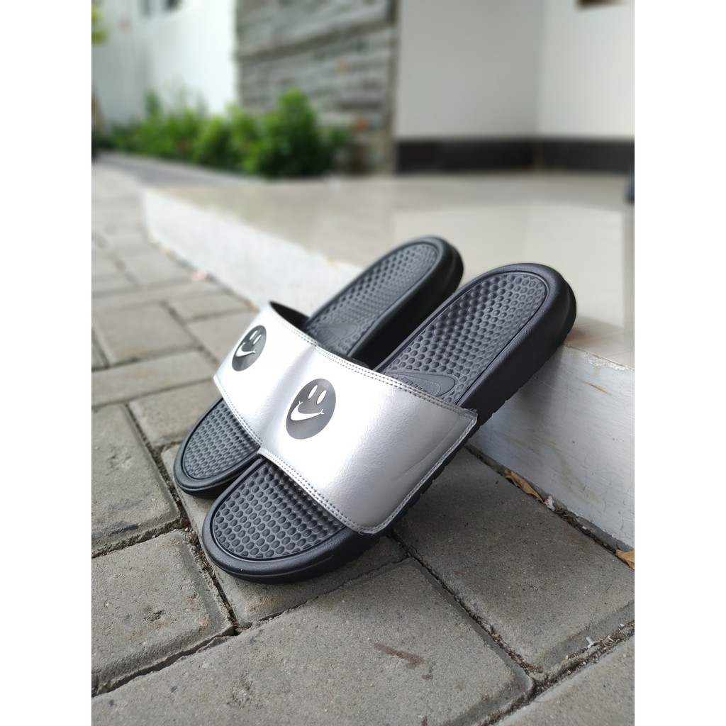 smile nike slides