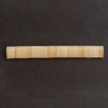 Kuku macan / Bonbon list keramik motif kayu 2x20cm