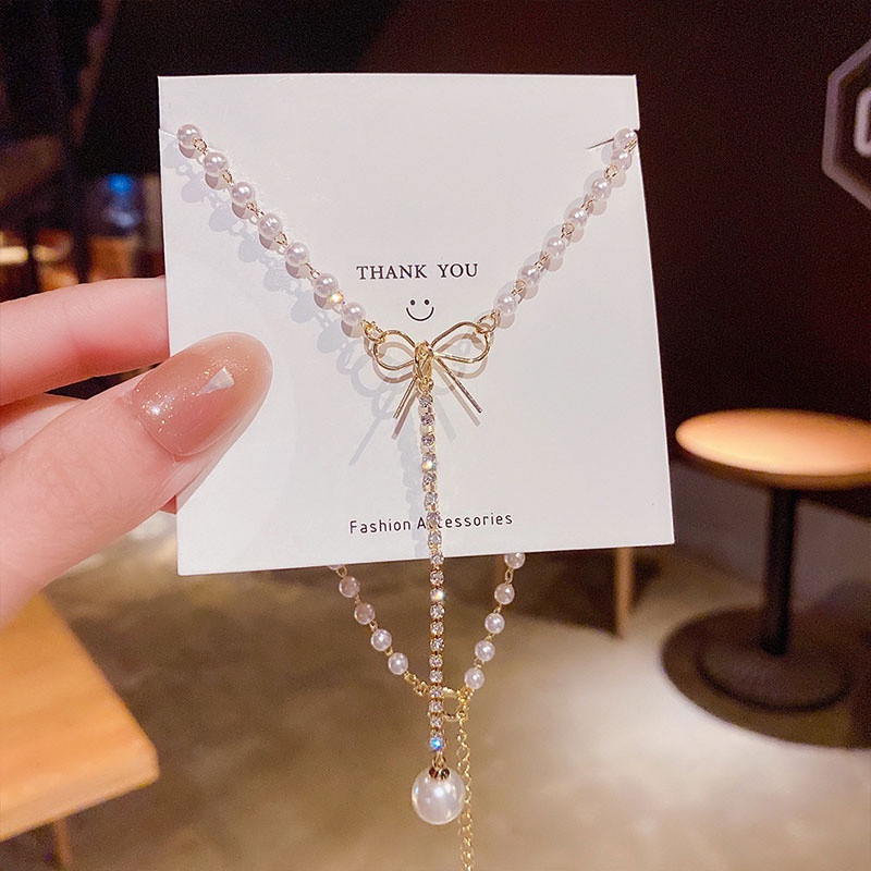 XiaoboACC Kalung Rantai Dengan Liontin Pita + Mutiara Gaya Korea Untuk Wanita 48.4CM+5.3CM