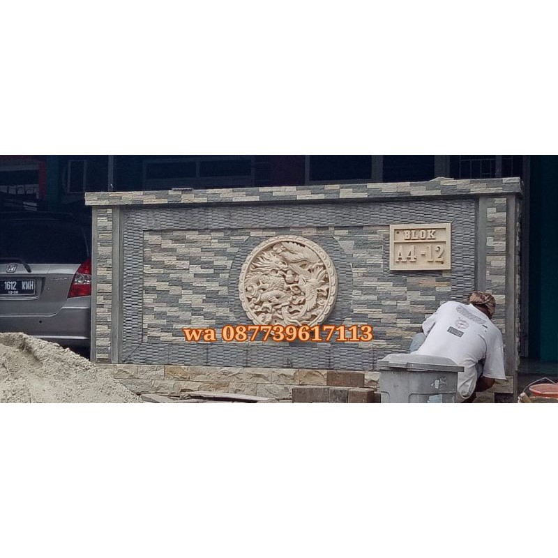 relief batu ukir paras jogja