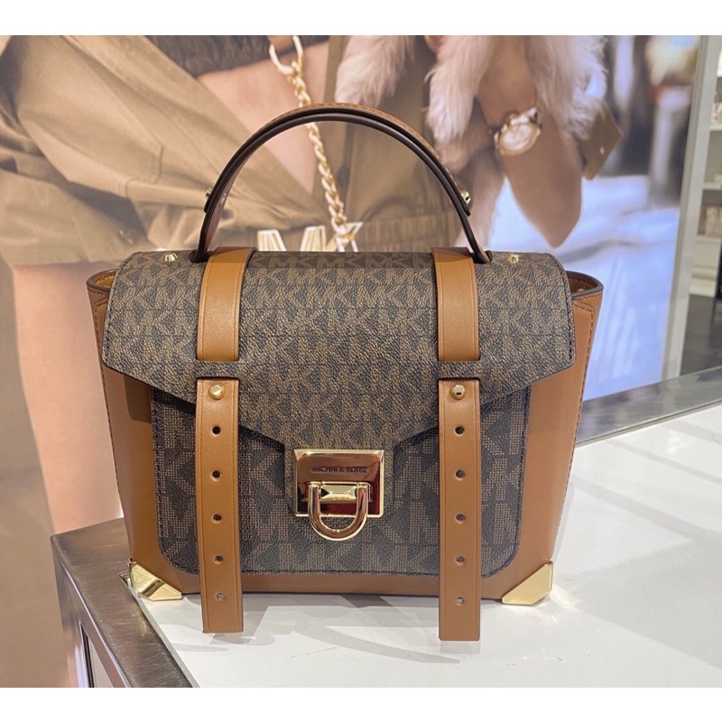 MK manhattan sign brown