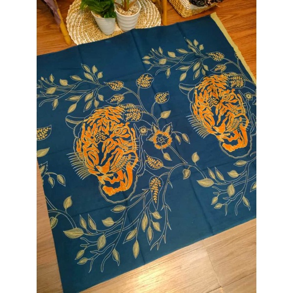 kain katun batik motif kepala harimau