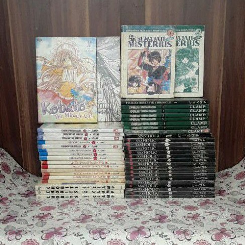 komik clamp:cardcaptor sakura, xxholic, tsubasa reservoir, chobits, kobato, si wajah misterius,etc