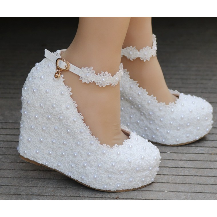 white wedge slip on