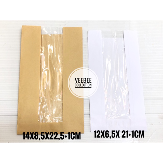 

Kantong kertas snack terlihat besar/ paperbag/ snack paperbag/ kantong/ plastik snack