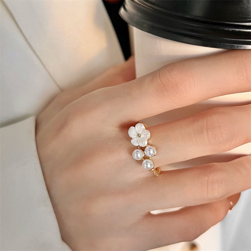 Cincin Model Terbuka Desain Bunga Aksen Mutiara Bahan Zirkon Gaya Korea Untuk Wanita