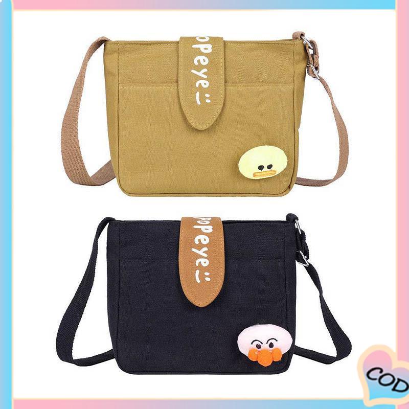 COD❤️ Tas Kanvas Wanita Messenger Tas Kecil Gadis Mahasiswa Kartun Lucu Tas Kanvas Bahu-A.one