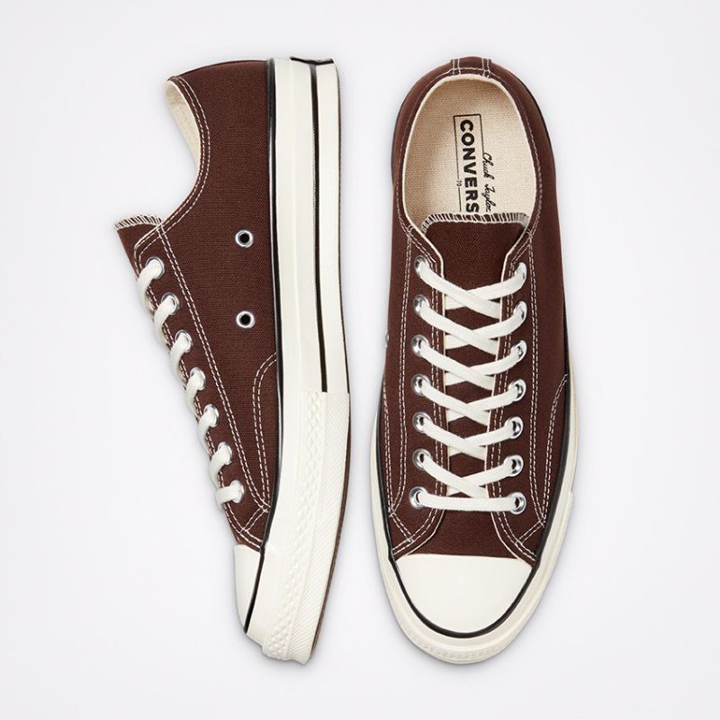 brown converse with star